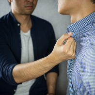 man assaulting another